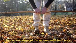 How to use a stringer to string up a longbow style bow [upl. by Aileon]