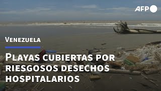 Desechos hospitalarios peligrosos quotjuguetesquot en infesta playa de Venezuela  AFP [upl. by Elleira]