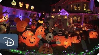 Couple Celebrates a Disney Halloween in Their Yard  Disney Parks [upl. by Arvonio]