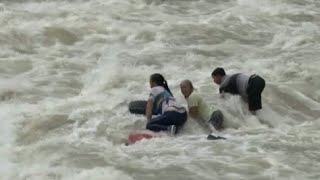 Firefighters Rescue Three from Flooded River in Southwest China [upl. by Madra974]