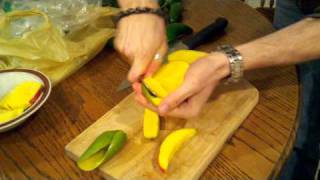 How to cut and quotpeelquot a mango [upl. by Nylzzaj]