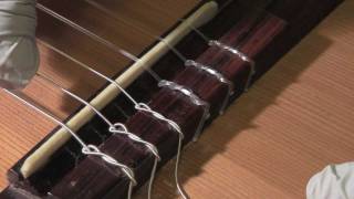 How to restring a classical guitar [upl. by Alrich151]