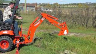 Kubota BX25D  First Time Trying the Backhoe [upl. by Hanyaz603]