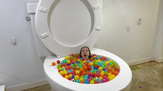 Going Under and JUMPING into the Worlds Largest Toilet Play Ball Pool with Splash [upl. by Llewen]