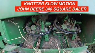 Knotter Slow Motion  John Deere 348 Square Baler [upl. by Hamlen291]