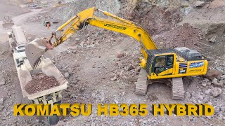 Komatsu HB365 Hybrid excavator digging the face and loading a crusher hybrid komatsu [upl. by Annatsirhc]