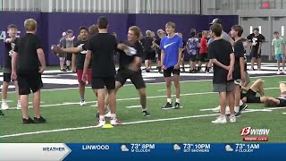 KState football players help kids in the Wamego Youth Football Camp [upl. by Bilac]