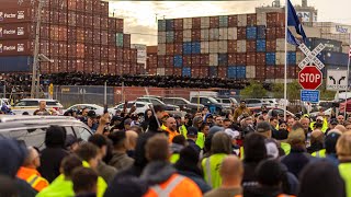 Port workers strike on both sides of the border in potentially crippling job action [upl. by Idissac]