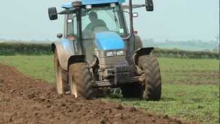 Ploughing with The New Holland Ts115 [upl. by Ielhsa]