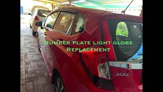 Honda Jazz number plate light Globe replacement  number plate bulb how to replace [upl. by Harbert582]