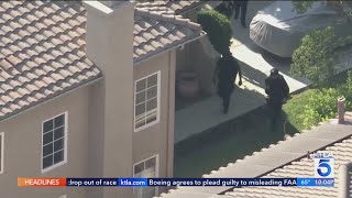 Home invasion turns violent in San Fernando Valley [upl. by Ozmo739]