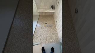 This is how a transition of shower floor to bathroom floor looks and sounds like curbless tiles [upl. by Ilojne]