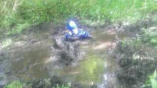 Mud fun in heavy rainwear gloves and gasmask [upl. by Carbone842]