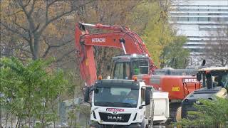 Excavator Hitachi 350 loads truck with rubble [upl. by Eeldivad]