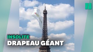 Pourquoi un drapeau géant a été accroché à la tour Eiffel [upl. by Bertram23]