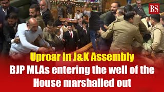 Uproar in JampK Assembly BJP MLAs entering the well of the House marshalled out [upl. by Leschen538]