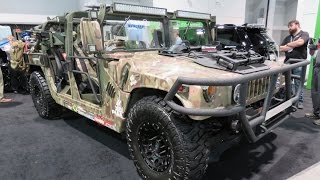 aftermarket parts for your military Hummer  SEMA show Las Vegas [upl. by Adaiha154]