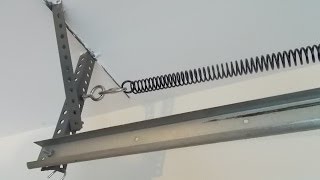 Replace a Broken Garage Door Spring [upl. by Teragram209]