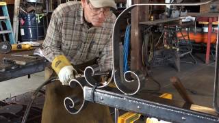 Adding a iron wrap to a custom forged chandelier [upl. by Bolan]