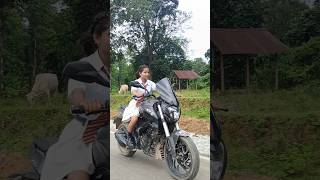 School girl bajaj dominar 400 bike ride shorts yotubeshorts viral ladybiker [upl. by Ellenehc]