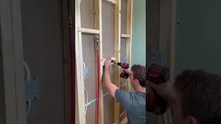 Installing a shower valve using pex shorts plumbing diy bathroom shower remodel renovation [upl. by Sucramad]