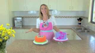 Covering Cake in Fondant using the Mat [upl. by Iahs]