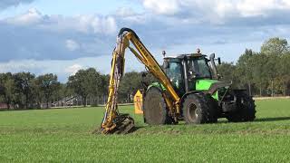 KLEPELEN VAN SLOOTKANTEN MET EEN DEUTZ FAHR AGROTRON M 610 MET EEN HERDER GRENADIER [upl. by Edla151]