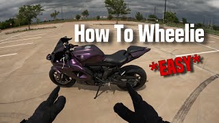 How To Wheelie ANY Motorcycle  Yamaha R7 Wheelie Tutorial [upl. by Che]