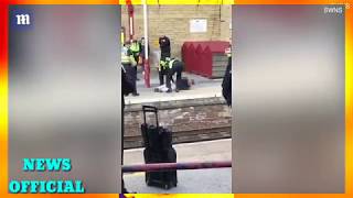 Police taser man with a knife at Keighley train station [upl. by Ocker]