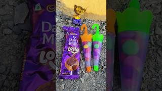 Swiss trupello chocolate amp dairy milk lolipop amp gems shorts dairymilk lollipop [upl. by Cherin]