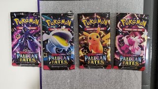 opening the 9 booster packs from paldean fates etb [upl. by Bolte]