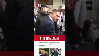 Tommy Robinson charged under Terrorism Act as he hands himself into police  LBC [upl. by Nnod]