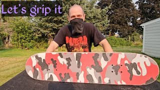 How to put grip tape on your skateboard 🛹 [upl. by Hgieleak454]