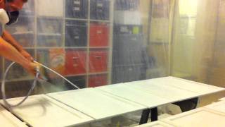 Spraying kitchen cabinets white with airless sprayer in garage [upl. by Eolande191]