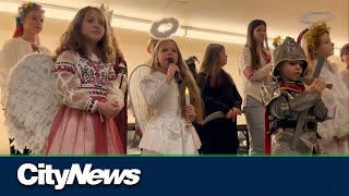 Newcomers from Ukraine celebrate the holidays through traditional carolling [upl. by Siul]