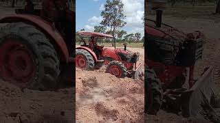 VS1281 KubotaM6040 tractor plowing [upl. by Kruger]