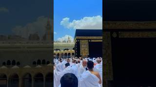 People wearing Ihram are standing in front of Kaaba shorts [upl. by Barna]