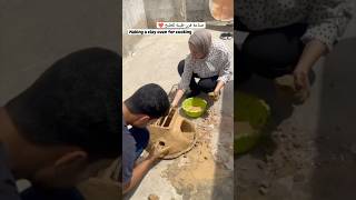 They are making clay oven due to shortage of gas fuel in Gaza clay oven diy homemade shorts [upl. by Waxler]