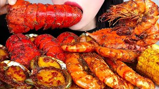 Asmr seafood boil mukbang lobster tail shirmp carb abalone sausage corn potatoes eattting sound [upl. by Ahseral]