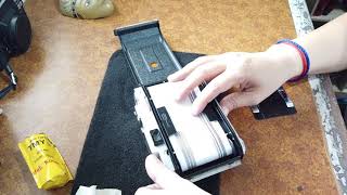 Loading a Mamiya 6 folding camera [upl. by Tallou]