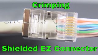 Shielded ezrj45 cat6 connectors being crimped [upl. by Amla780]