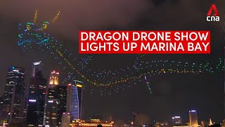 Dragon made up of drones lights up Singapores Marina Bay for Legend of the Dragon Gate show [upl. by Goebel870]