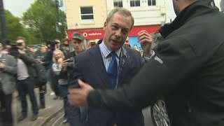 Nigel Farage hit by an egg in Nottingham [upl. by Ellenig]