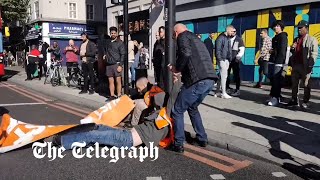 I have to go to hospital Motorists drag Just Stop Oil protesters off the road in London [upl. by Suidualc]