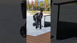 Go out with carbon fiber electric wheelchair to get a cup of coffeehandicappedelderlydisability [upl. by Alarise]