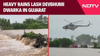 Gujarat Rain News  IAF Chopper Rescues 3 As Heavy Rains Lash Devbhumi Dwarka In Gujarat [upl. by Selwyn]