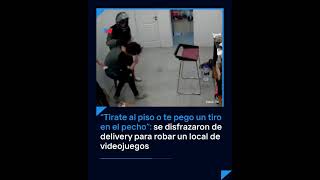 quotTe pego un tiro en el pechoquot se disfrazaron de delivery para robar un local de videojuegos [upl. by Ramalahs648]