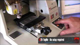 Gravograph M20 Machine Engraving a Cell Phone with TagMe Software [upl. by Aronas610]