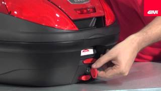 GIVI  Operating GIVI luggage latching system [upl. by Suirrad]