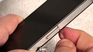 iPhone 4  How to Remove and Insert a SIM Card [upl. by Aelsel]